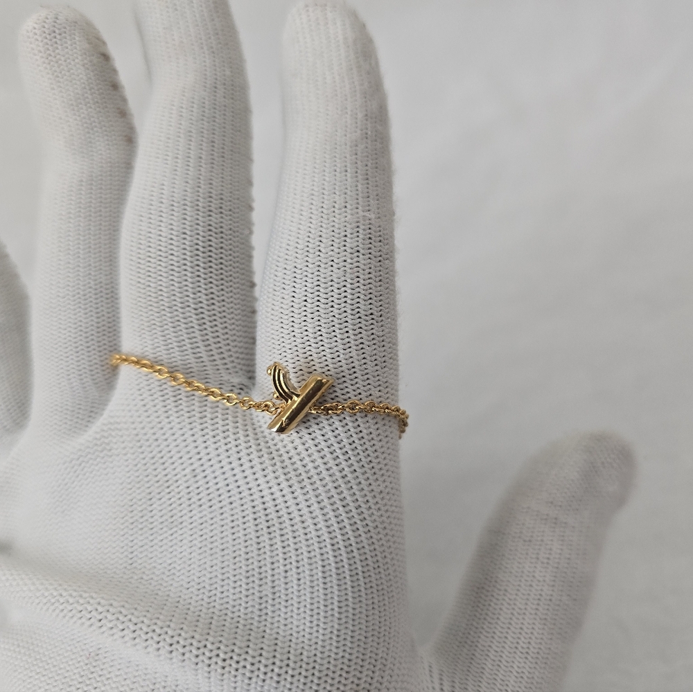 LOUIS VUITTON Gold Charm Bracelet - Picture 5 of 9